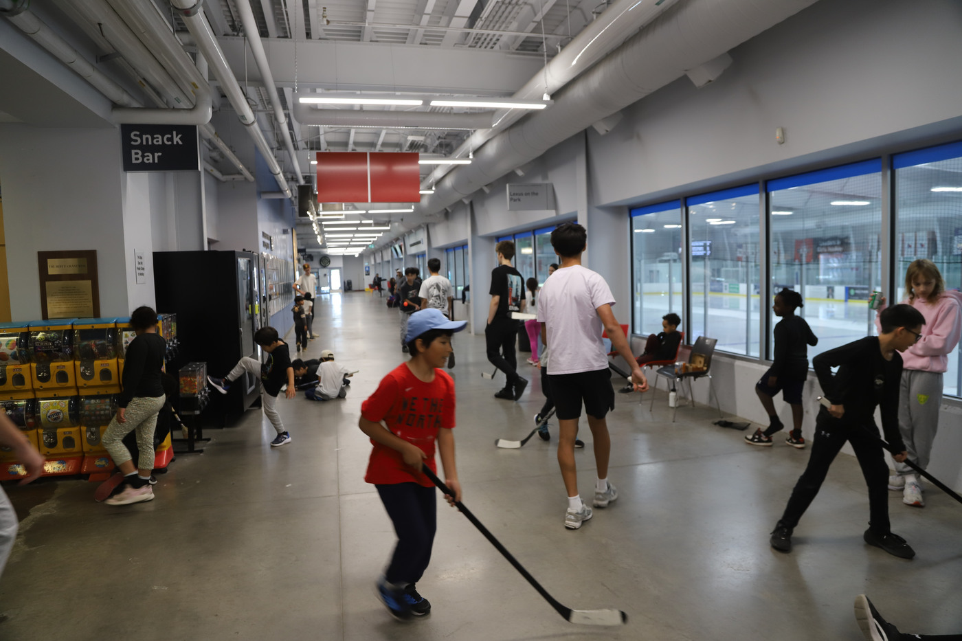 Hallway floor hockey on the first morning, while the rest of the camp was still being fitted for equipment